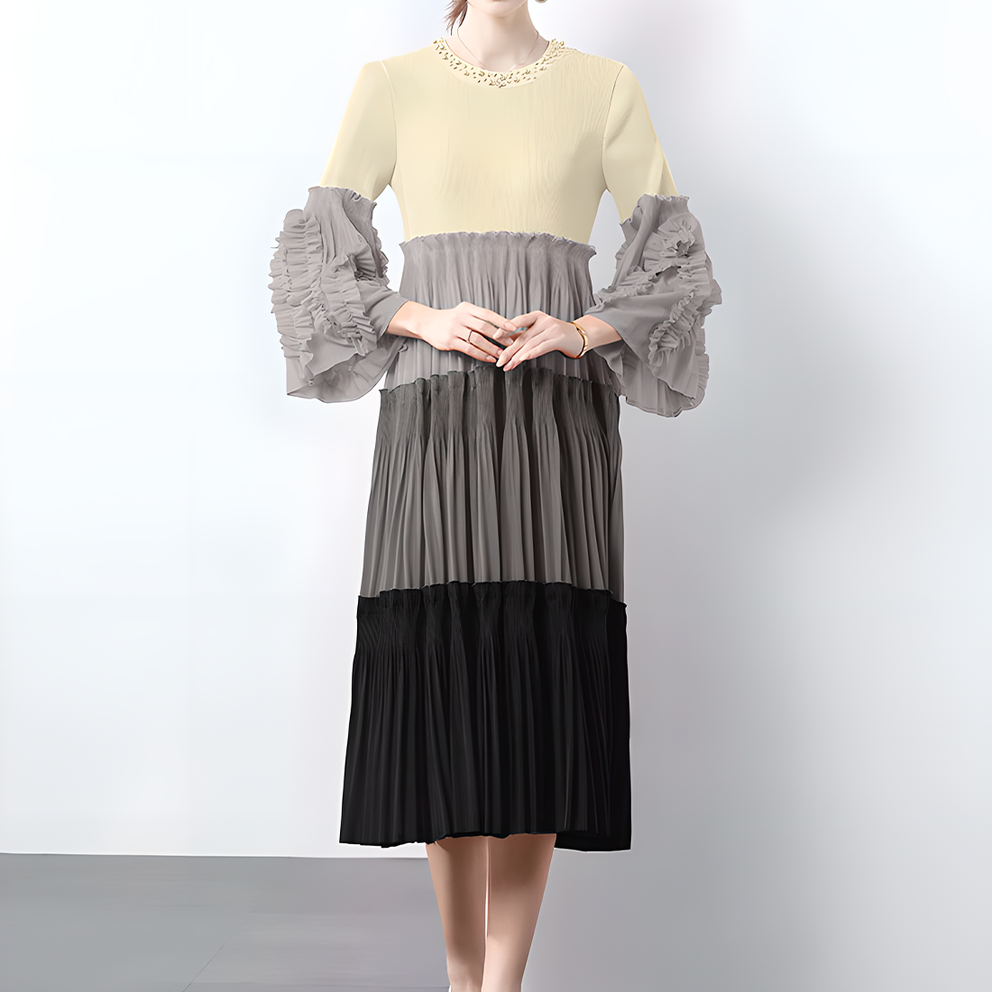 Elegant and Fashionable Pleated Dress with Ruffled Sleeves