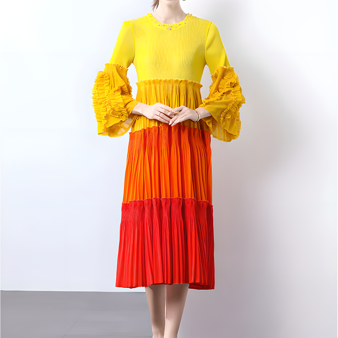 Elegant and Fashionable Pleated Dress with Ruffled Sleeves